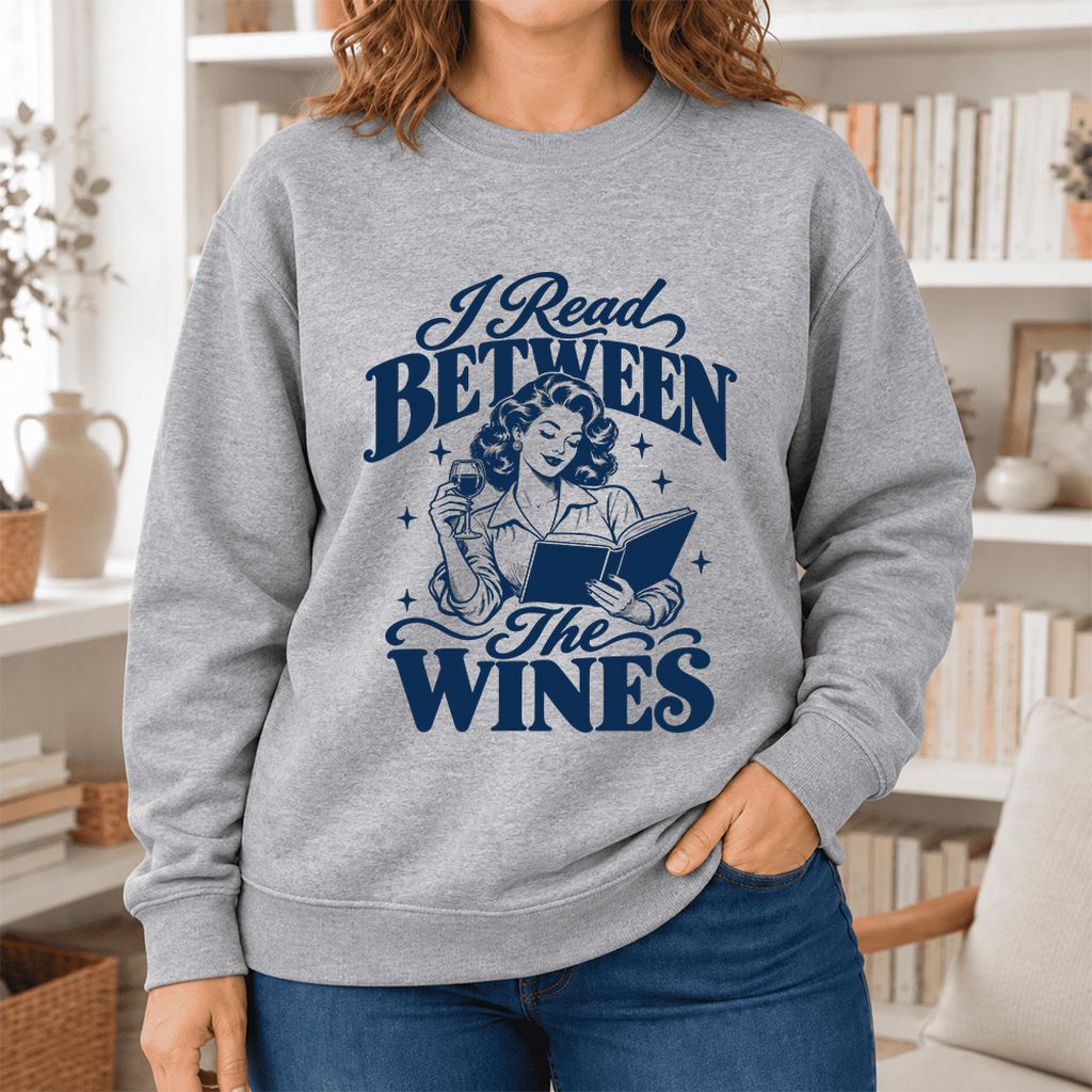 I Read Between The Wines Softstyle Sweatshirt | Cozy Book Lover Gift Sport Grey
