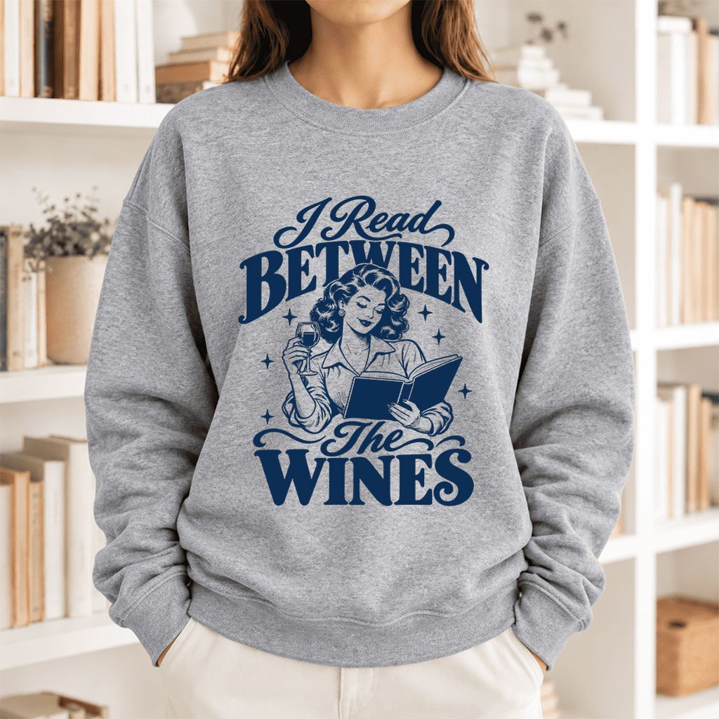 I Read Between The Wines Softstyle Sweatshirt | Cozy Book Lover Gift Sport Grey
