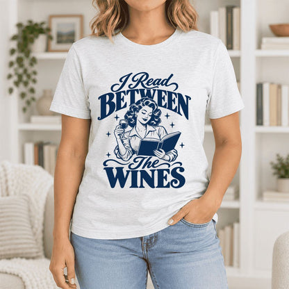 I Read Between The Wines Ultra-Soft Cotton T-Shirt | Cozy Book Lover Gift Ash