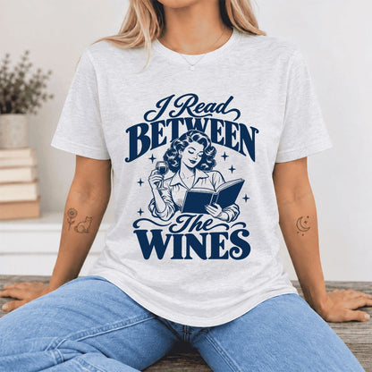 I Read Between The Wines Ultra-Soft Cotton T-Shirt | Cozy Book Lover Gift Ash