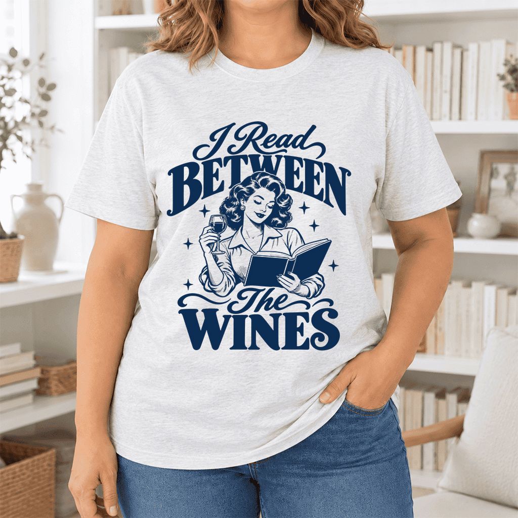 I Read Between The Wines Ultra-Soft Cotton T-Shirt | Cozy Book Lover Gift Ash