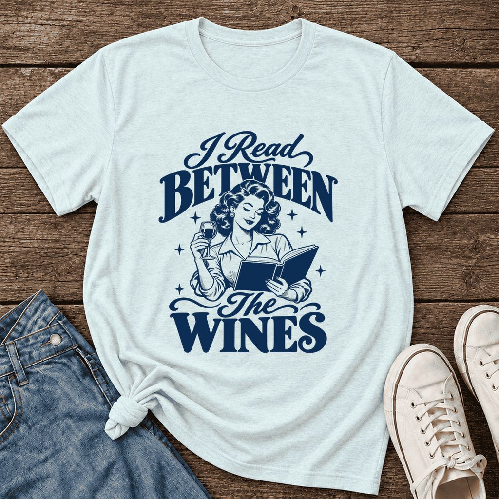 I Read Between The Wines Ultra-Soft Cotton T-Shirt | Cozy Book Lover Gift Heather Ice Blue