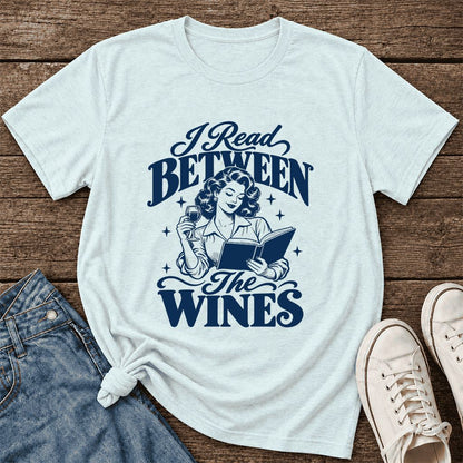 I Read Between The Wines Ultra-Soft Cotton T-Shirt | Cozy Book Lover Gift Heather Ice Blue