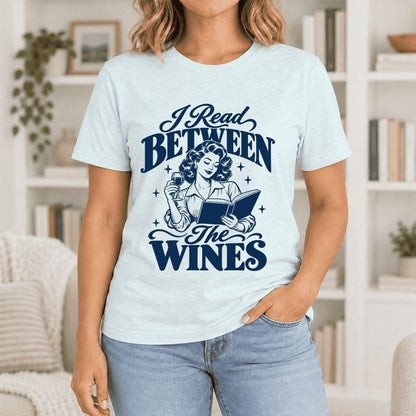 I Read Between The Wines Ultra-Soft Cotton T-Shirt | Cozy Book Lover Gift Heather Ice Blue