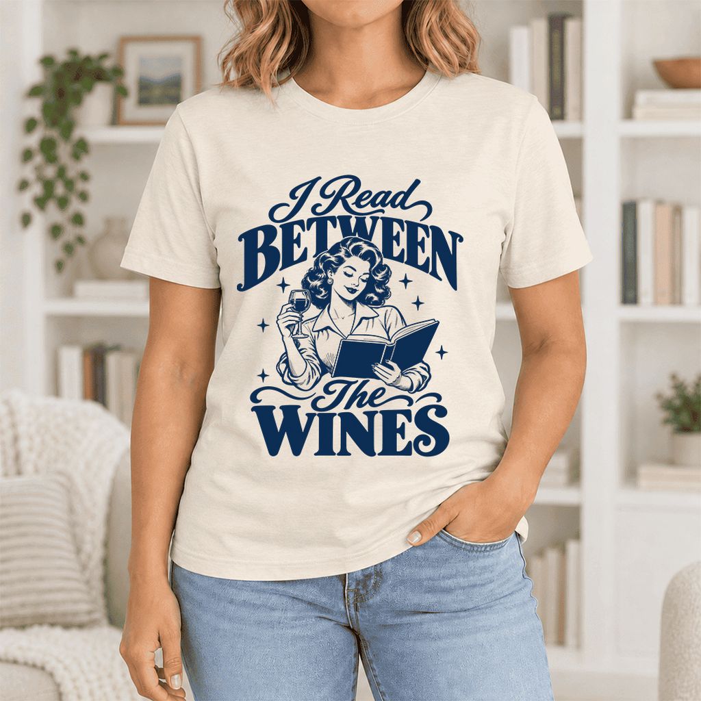 I Read Between The Wines Ultra-Soft Cotton T-Shirt | Cozy Book Lover Gift Natural
