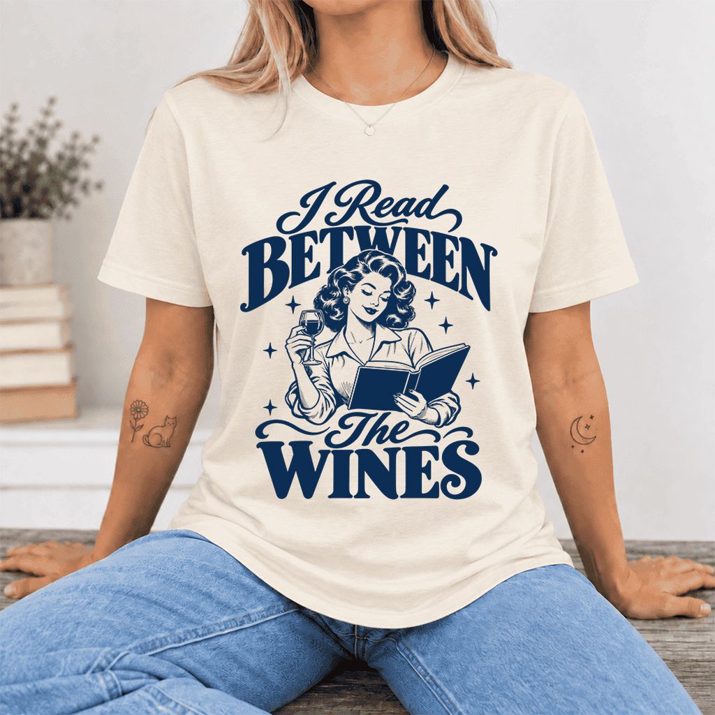I Read Between The Wines Ultra-Soft Cotton T-Shirt | Cozy Book Lover Gift Natural