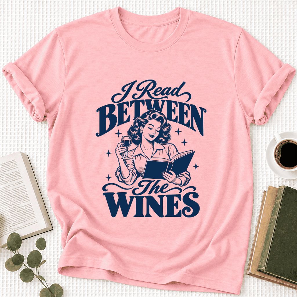 I Read Between The Wines Ultra-Soft Cotton T-Shirt | Cozy Book Lover Gift Pink