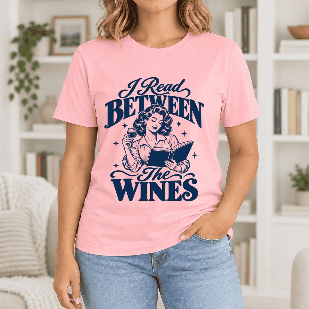 I Read Between The Wines Ultra-Soft Cotton T-Shirt | Cozy Book Lover Gift Pink
