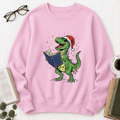 T-Rex Wearing Santa Hat And Reading Printed Sweatshirt | Christmas Reader Gift Light Pink