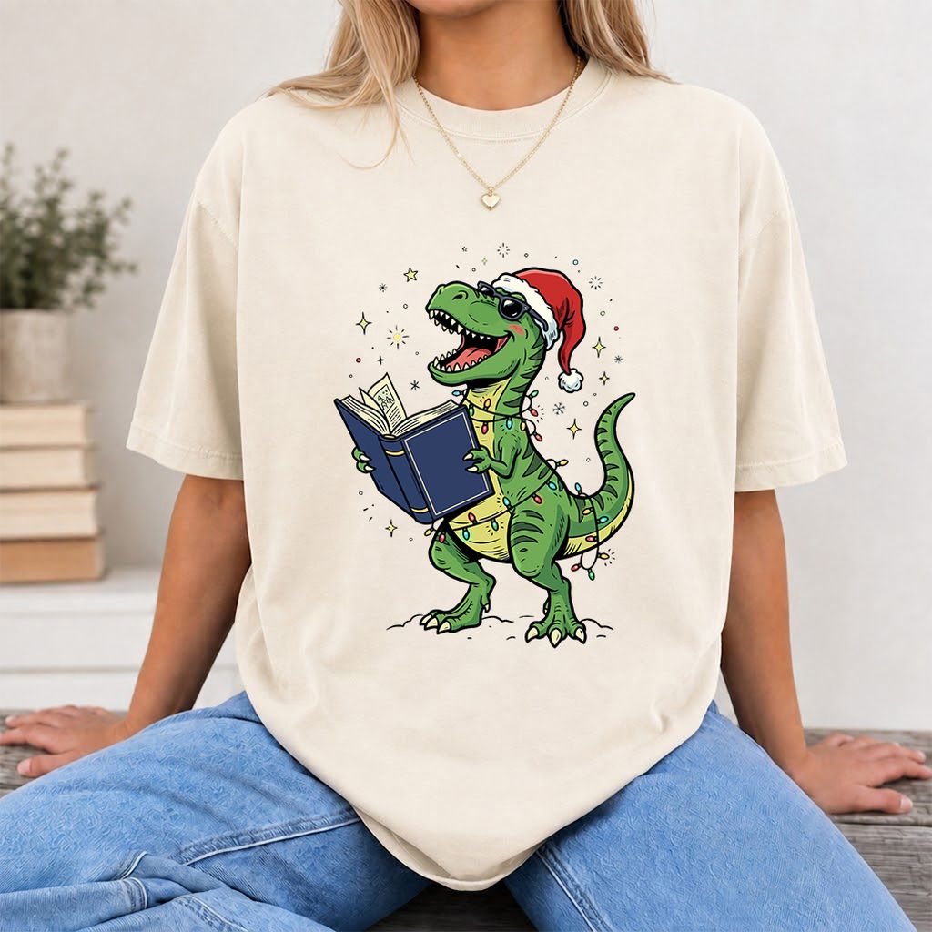 T-Rex Wearing Santa Hat And Reading Printed T-Shirt | Christmas Reader Gift Natural