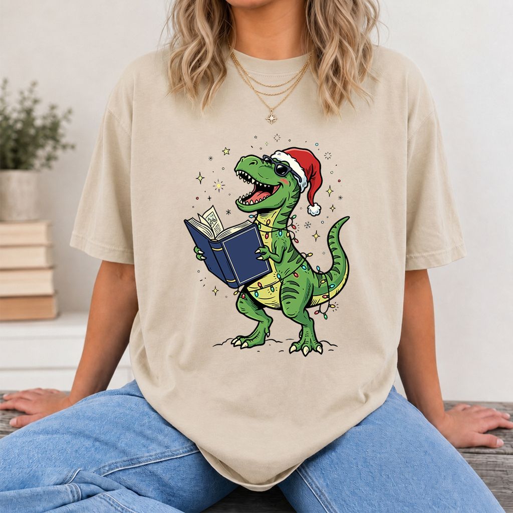 T-Rex Wearing Santa Hat And Reading Printed T-Shirt | Christmas Reader Gift Sand