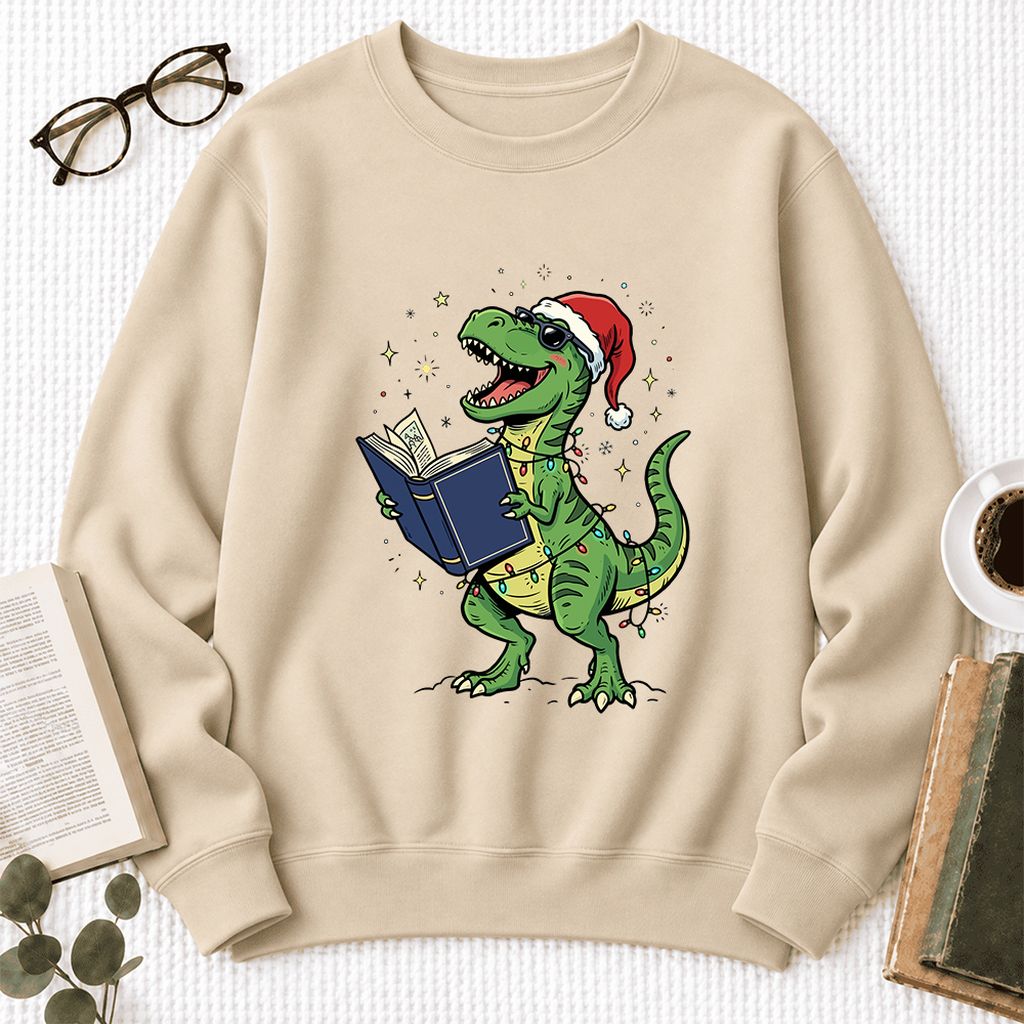T-Rex Wearing Santa Hat And Reading Softstyle Sweatshirt | Christmas Reader Gift Sand
