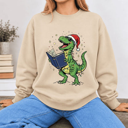 T-Rex Wearing Santa Hat And Reading Softstyle Sweatshirt | Christmas Reader Gift Sand