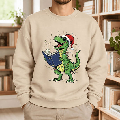 T-Rex Wearing Santa Hat And Reading Softstyle Sweatshirt | Christmas Reader Gift Sand