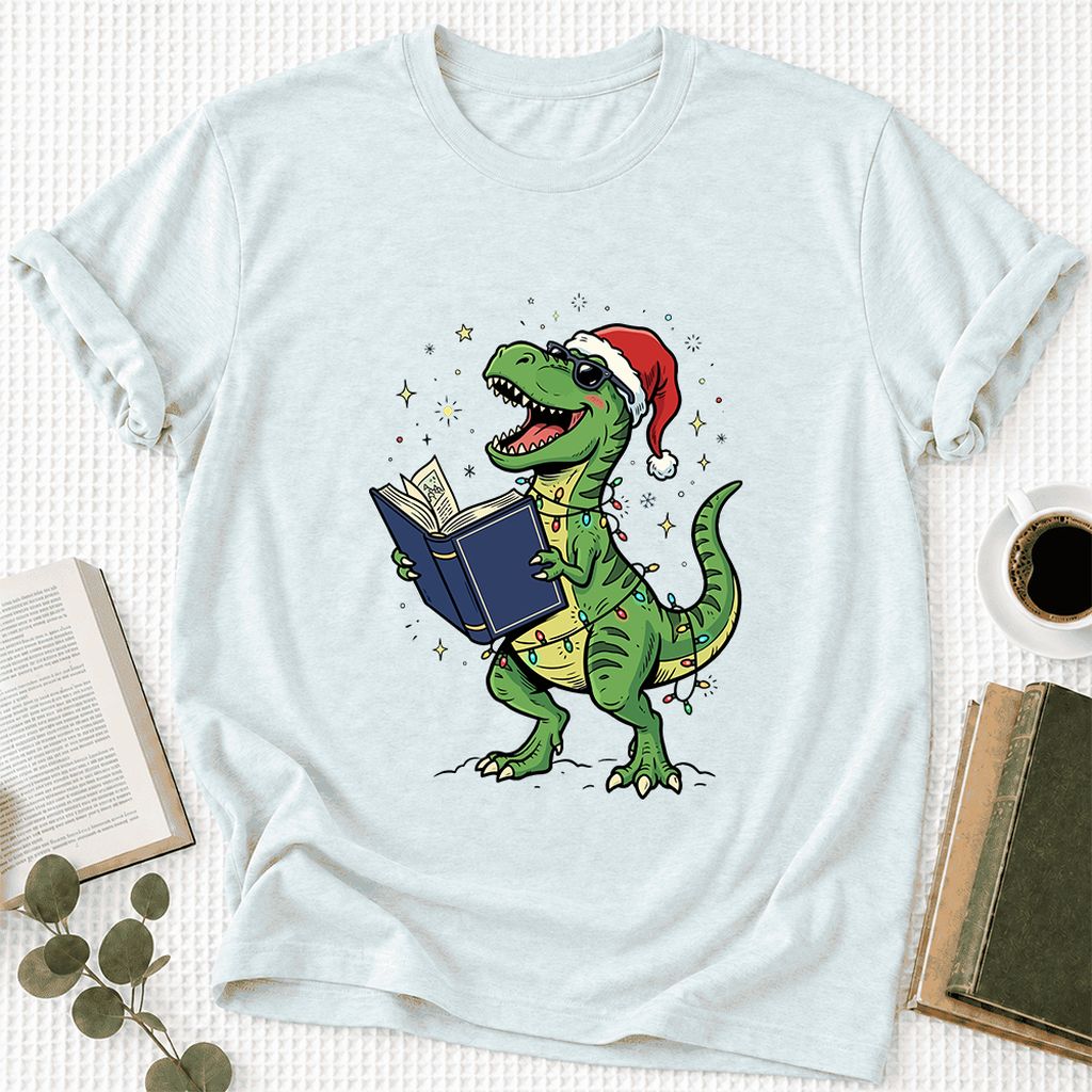 T-Rex Wearing Santa Hat And Reading Ultra-Soft Cotton T-Shirt | Christmas Gift Heather Ice Blue