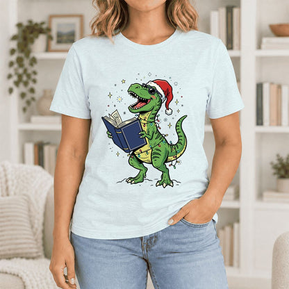 T-Rex Wearing Santa Hat And Reading Ultra-Soft Cotton T-Shirt | Christmas Gift Heather Ice Blue