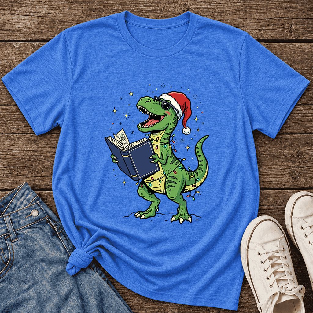 T-Rex Wearing Santa Hat And Reading Ultra-Soft Cotton T-Shirt | Christmas Gift Heather True Royal
