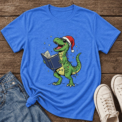 T-Rex Wearing Santa Hat And Reading Ultra-Soft Cotton T-Shirt | Christmas Gift Heather True Royal