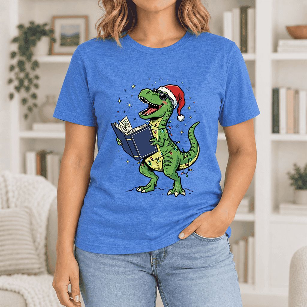 T-Rex Wearing Santa Hat And Reading Ultra-Soft Cotton T-Shirt | Christmas Gift Heather True Royal
