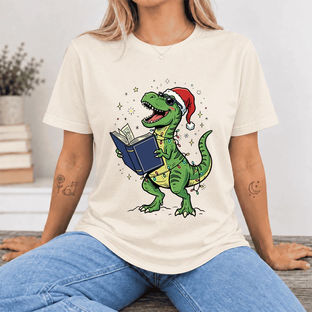 T-Rex Wearing Santa Hat And Reading Ultra-Soft Cotton T-Shirt | Christmas Gift Natural