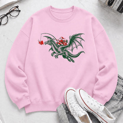 Santa Riding Green Dragon Printed Sweatshirt | Christmas Fantasy Reader Gift Light Pink
