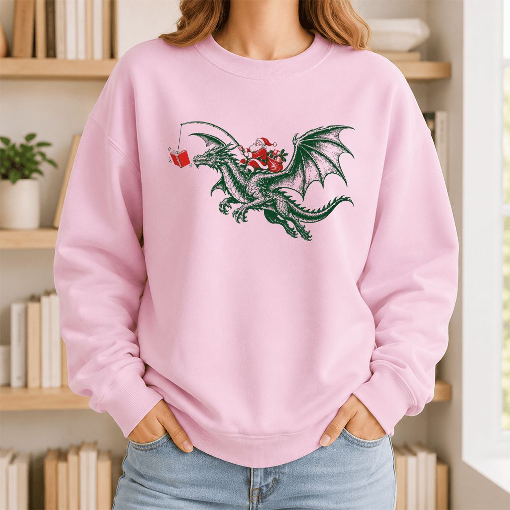 Santa Riding Green Dragon Printed Sweatshirt | Christmas Fantasy Reader Gift Light Pink