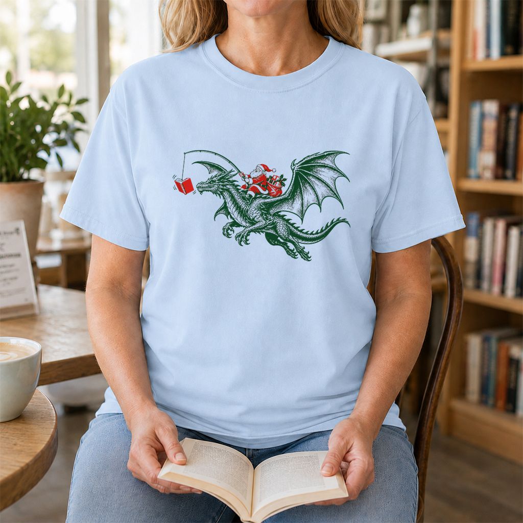 Santa Riding Green Dragon Printed T-Shirt | Christmas Fantasy Reader Gift Light Blue