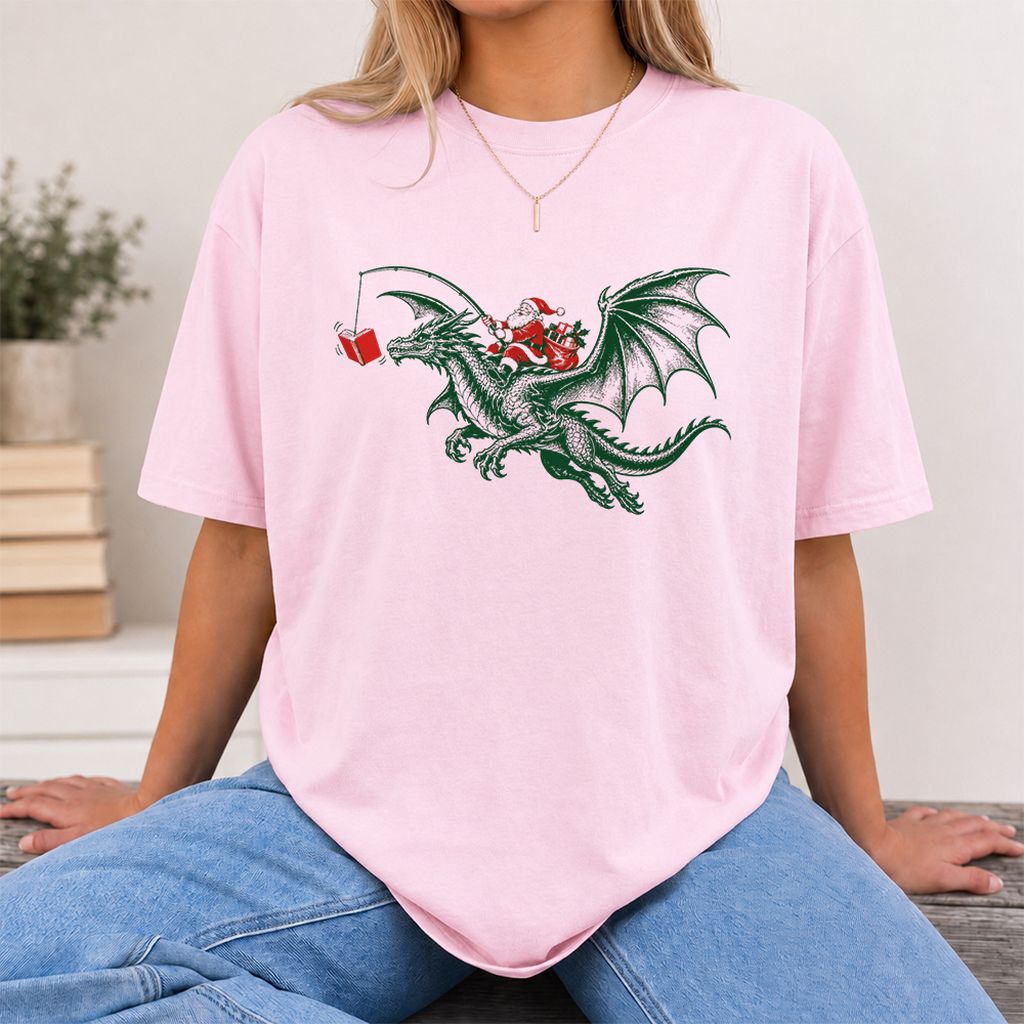 Santa Riding Green Dragon Printed T-Shirt | Christmas Fantasy Reader Gift Light Pink