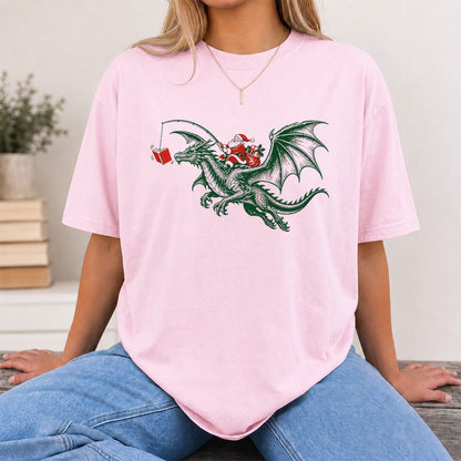 Santa Riding Green Dragon Printed T-Shirt | Christmas Fantasy Reader Gift Light Pink