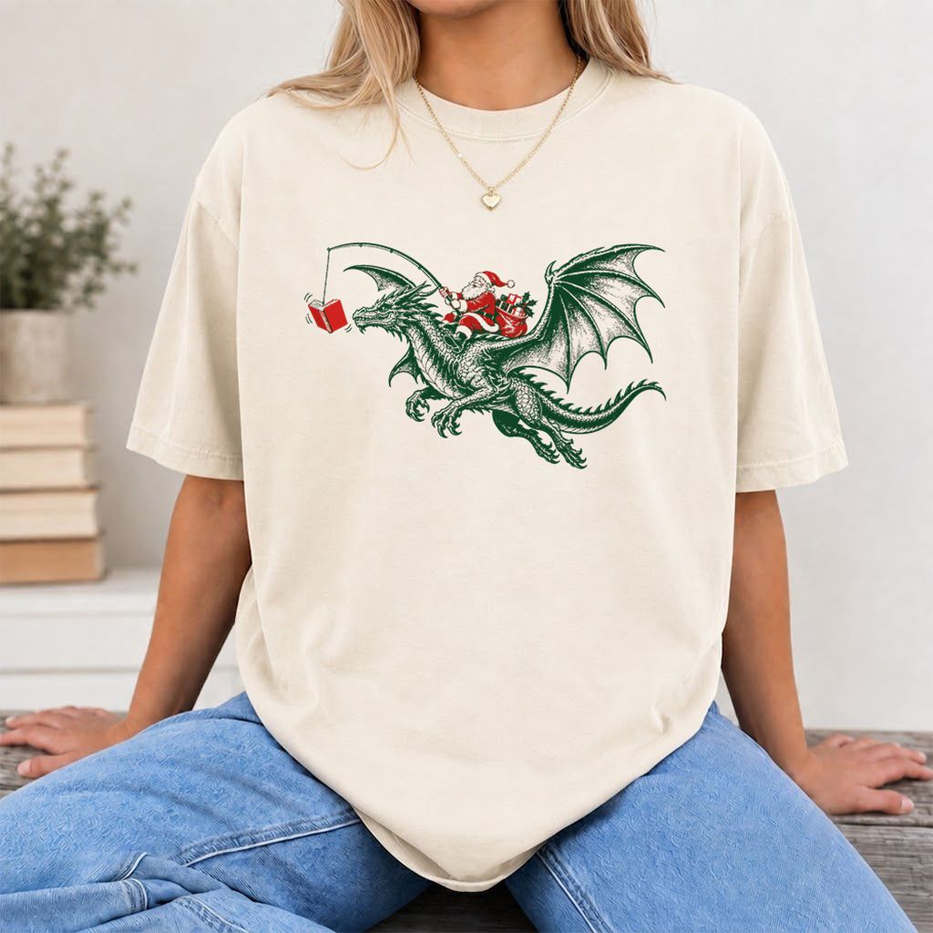 Santa Riding Green Dragon Printed T-Shirt | Christmas Fantasy Reader Gift Natural