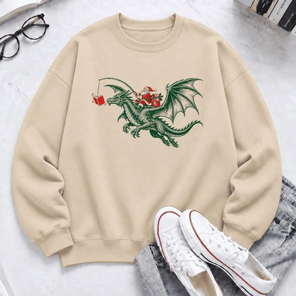 Santa Riding Green Dragon Softstyle Sweatshirt | Christmas Fantasy Reader Gift Sand