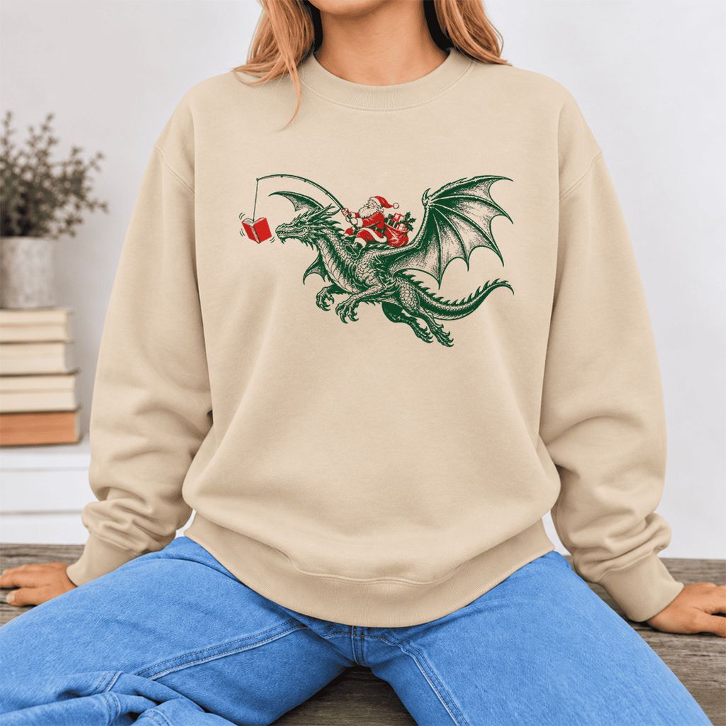 Santa Riding Green Dragon Softstyle Sweatshirt | Christmas Fantasy Reader Gift Sand