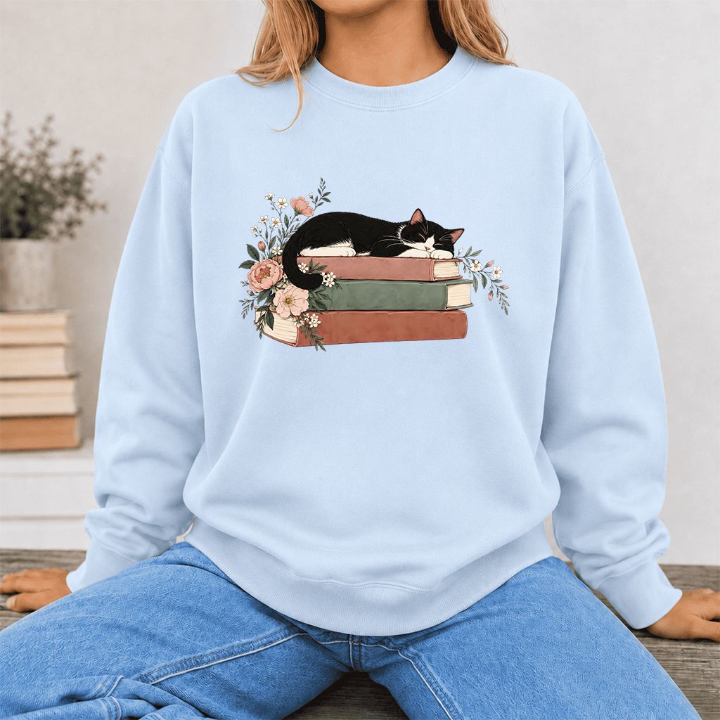 Sleeping Tuxedo Cat On Books Crewneck Sweatshirt | Cat Lover Reader Gift Light Blue