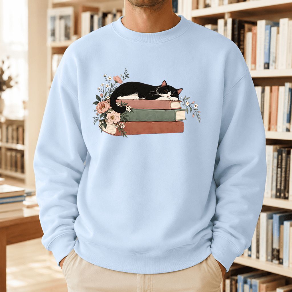 Sleeping Tuxedo Cat On Books Crewneck Sweatshirt | Cat Lover Reader Gift Light Blue