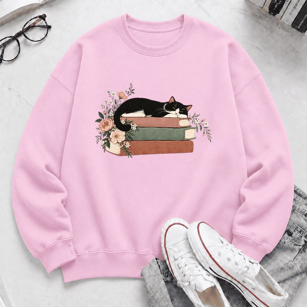 Sleeping Tuxedo Cat On Books Crewneck Sweatshirt | Cat Lover Reader Gift Light Pink