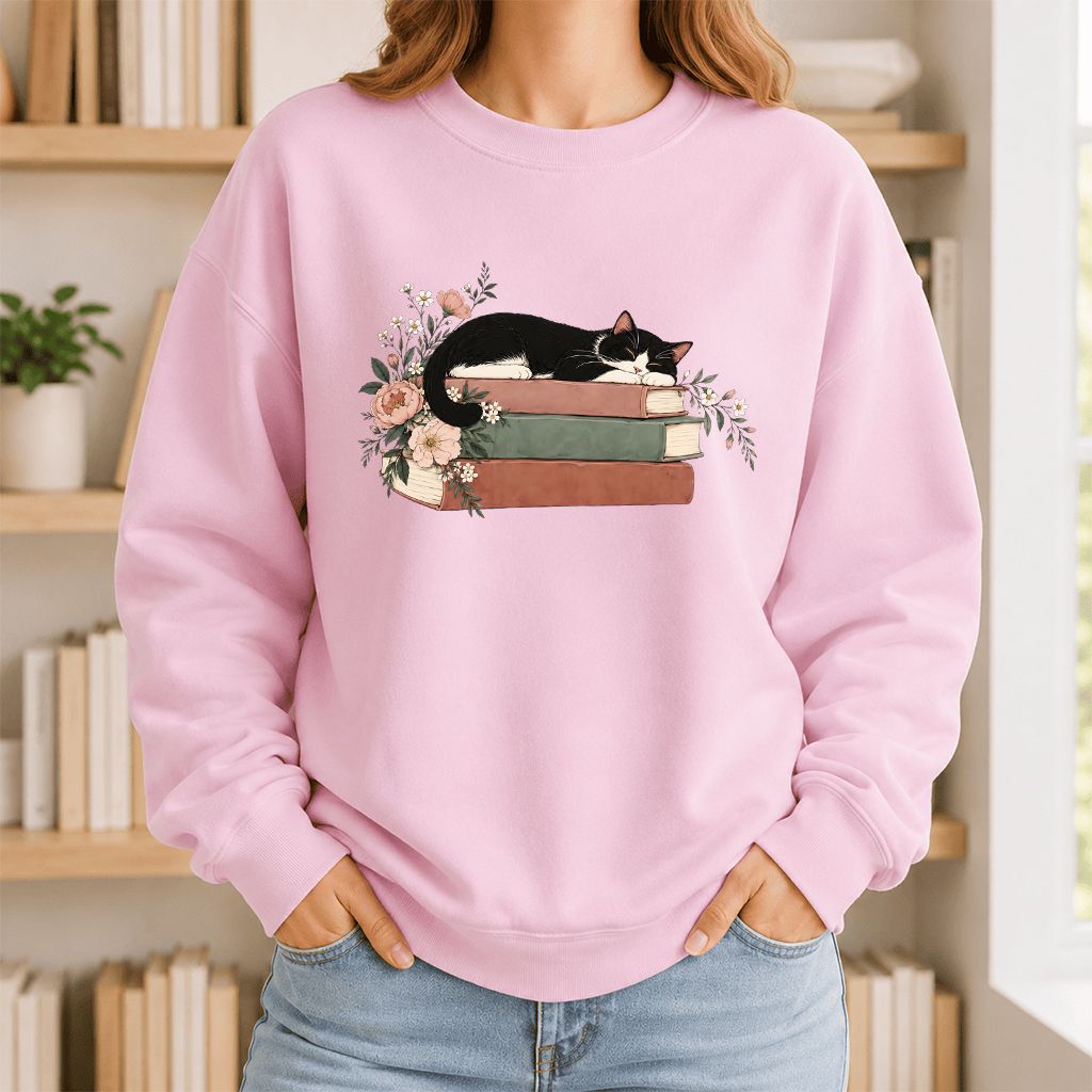 Sleeping Tuxedo Cat On Books Crewneck Sweatshirt | Cat Lover Reader Gift Light Pink