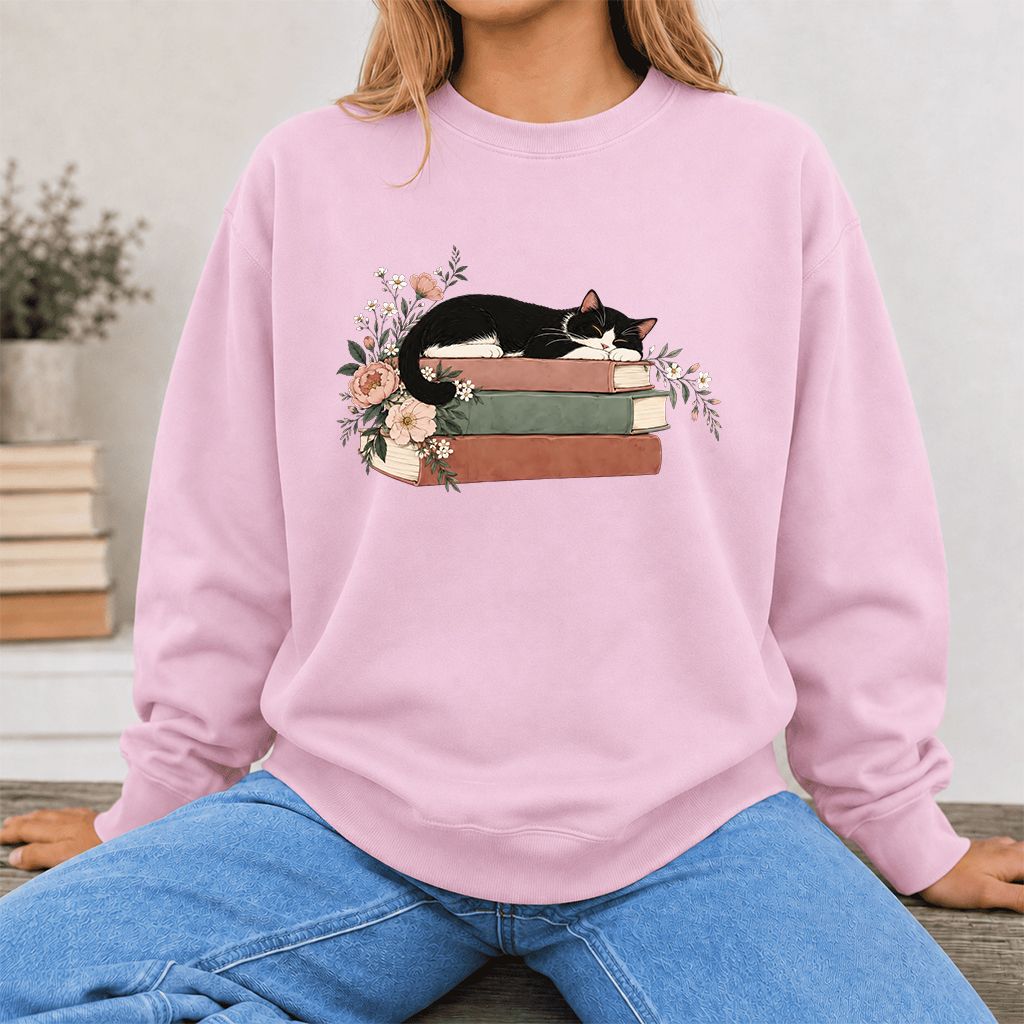 Sleeping Tuxedo Cat On Books Crewneck Sweatshirt | Cat Lover Reader Gift Light Pink