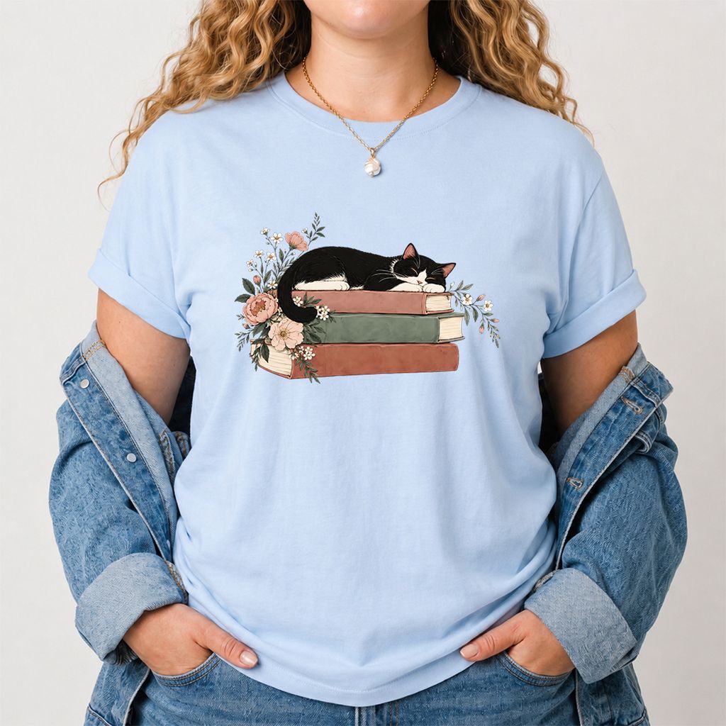 Sleeping Tuxedo Cat On Books Printed T-Shirt | Cat Lover Reader Gift Light Blue
