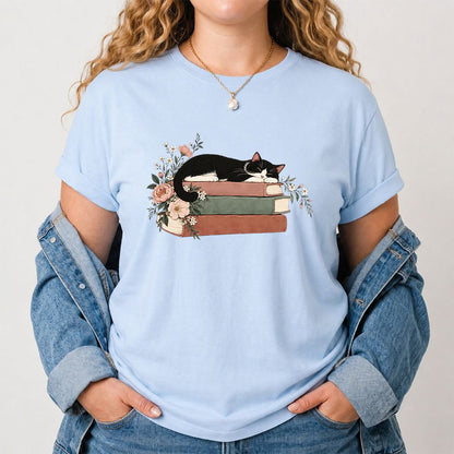 Sleeping Tuxedo Cat On Books Printed T-Shirt | Cat Lover Reader Gift Light Blue