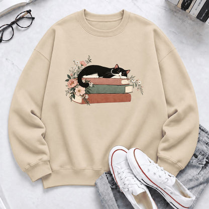 Sleeping Tuxedo Cat On Books Softstyle Sweatshirt | Cat Lover Reader Gift Sand