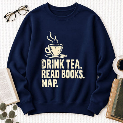 Drink Tea Read Books Nap Softstyle Sweatshirt | Cozy Book Lover Gift Navy