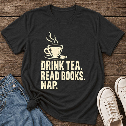 Drink Tea Read Books Nap Ultra-Soft Cotton T-Shirt | Cozy Book Lover Gift Black Heather