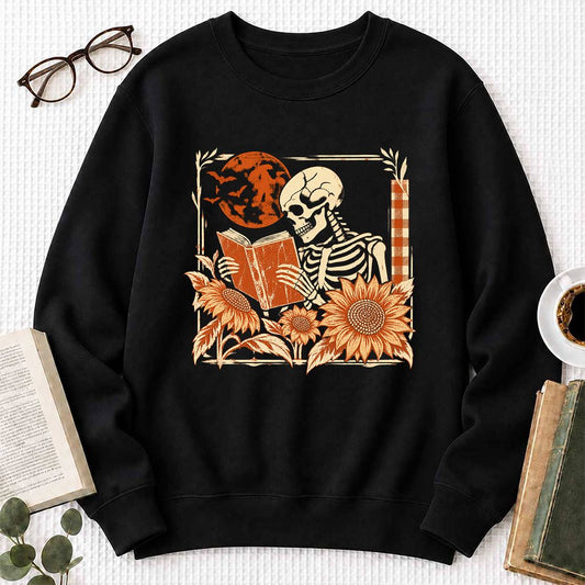 Skeleton Reading Sunflowers Crewneck Sweatshirt | Halloween Book Lover Gift Black