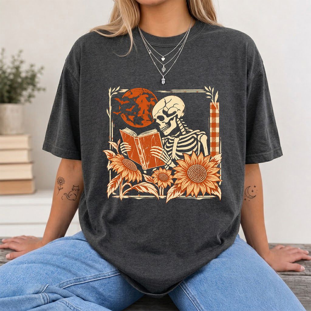 Skeleton Reading Sunflowers Printed T-Shirt | Halloween Book Lover Gift Dark Heather