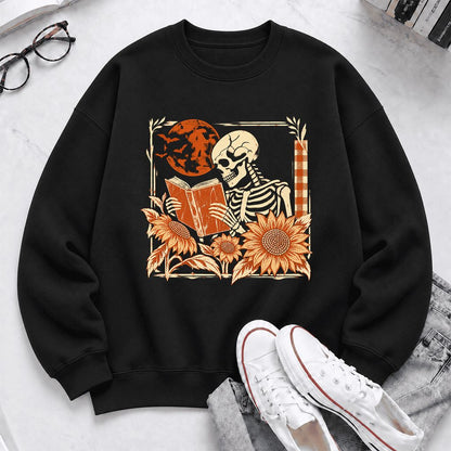 Skeleton Reading Sunflowers Softstyle Sweatshirt | Halloween Book Lover Gift Black