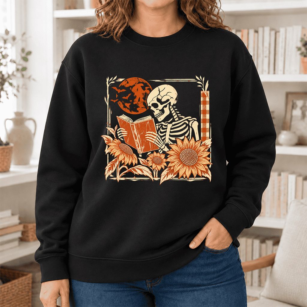 Skeleton Reading Sunflowers Softstyle Sweatshirt | Halloween Book Lover Gift Black