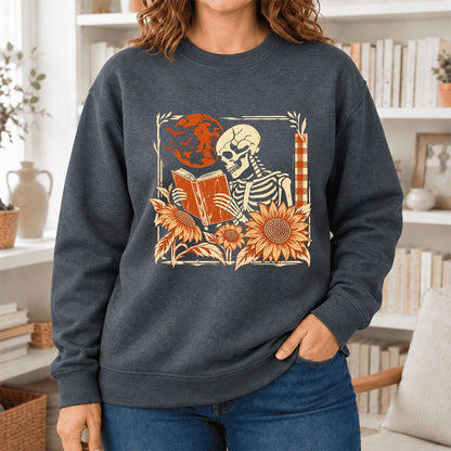Skeleton Reading Sunflowers Softstyle Sweatshirt | Halloween Book Lover Gift Dark Heather