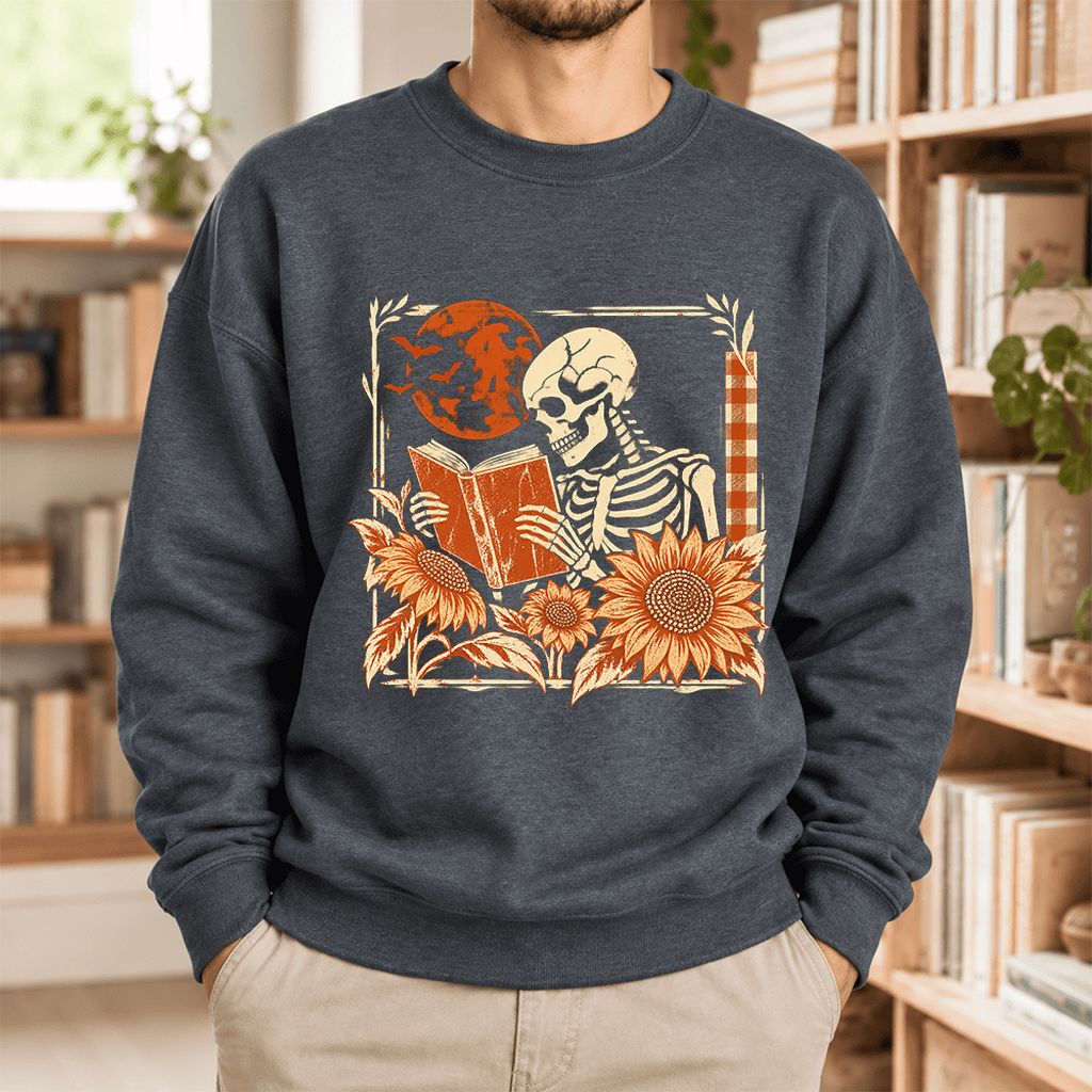 Skeleton Reading Sunflowers Softstyle Sweatshirt | Halloween Book Lover Gift Dark Heather