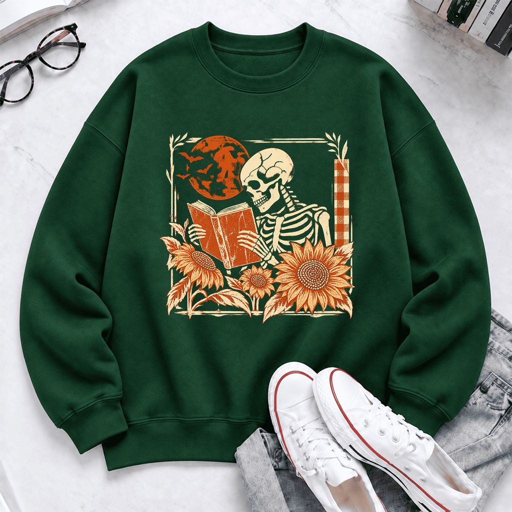 Skeleton Reading Sunflowers Softstyle Sweatshirt | Halloween Book Lover Gift Forest Green