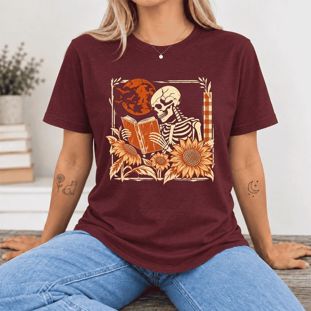 Skeleton Reading Sunflowers Ultra-Soft Cotton T-Shirt | Halloween Reader Gift Maroon